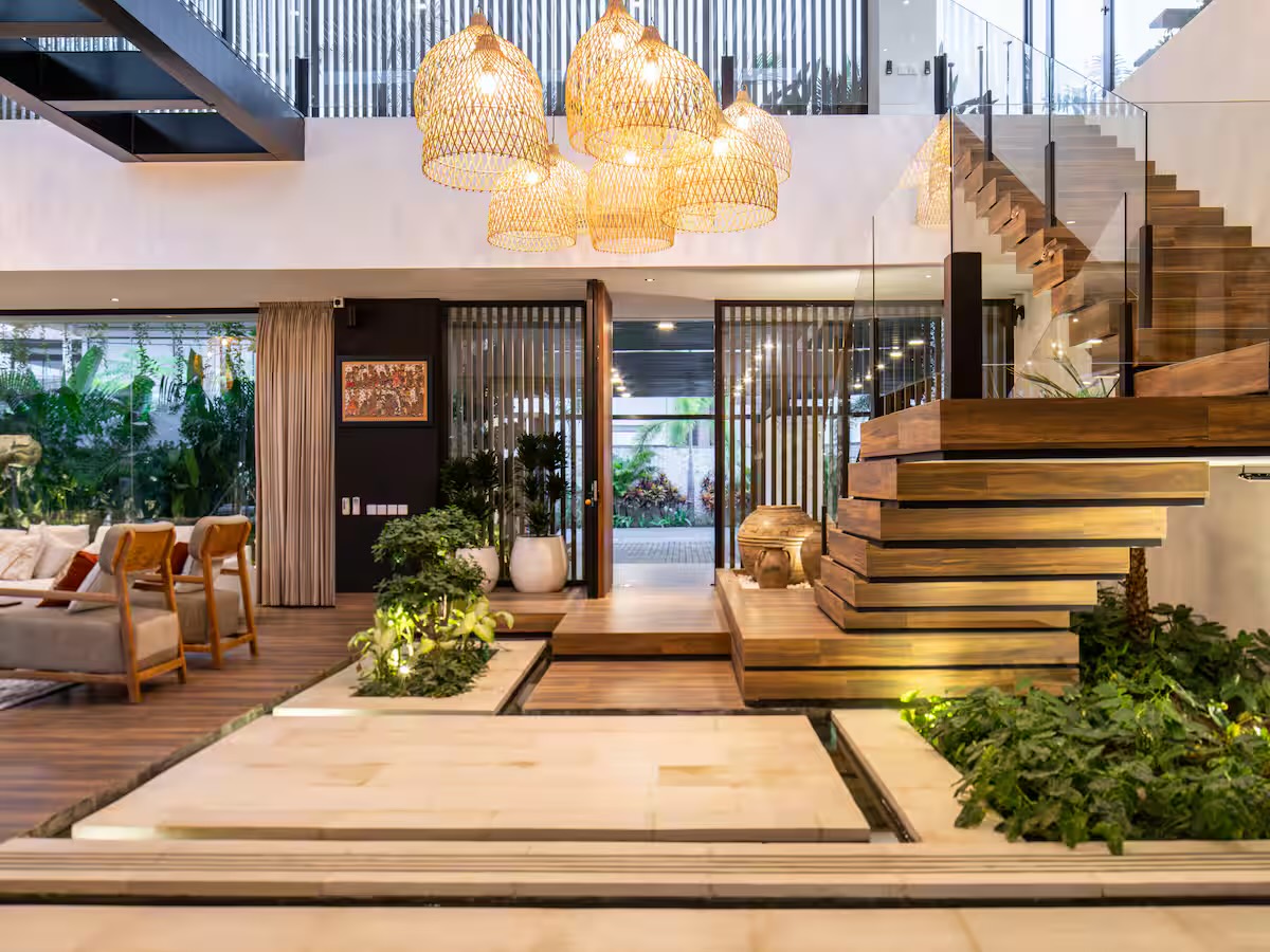 Timber entry steps and planting inside the villa